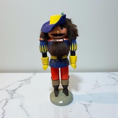 Sale Photo Thumbnail #852: Musketeer Nutcracker   Made in Germany  Paint Peeling on hat
Approximately 8.5"