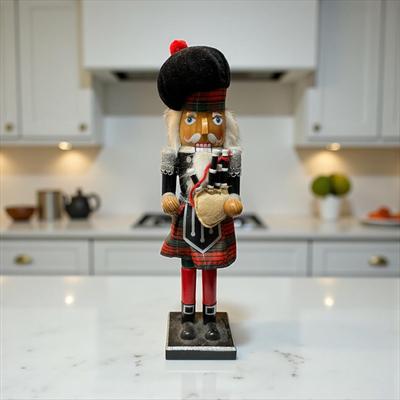 Sale Photo Thumbnail #895: Scottish Bagpipe Player Nutcracker
Approximately 16" Tall