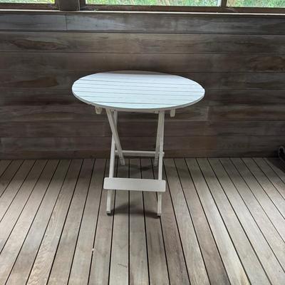Sale Photo Thumbnail #691: Table is in good condition
Measures: 29" high x 30" diameter