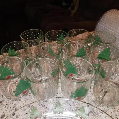 Sale Photo Thumbnail #351: 1988 Dayton Christmas Tree Glassware Made in France | 8" Plate & Mug Set

12 Mugs, Over 18 Snack Plates, and 1 Serving Dish

Highly sought after especially in this large of a set