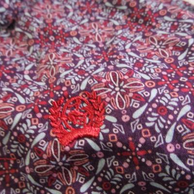 2 women's button-down long-sleeve shirts