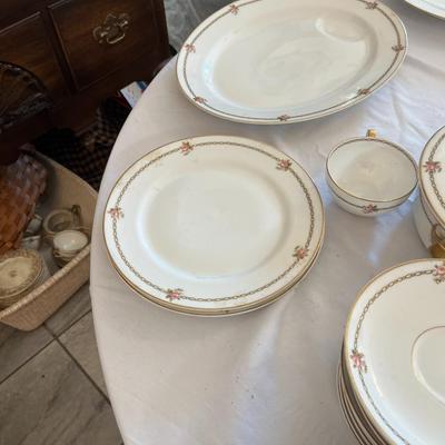 Sale Photo Thumbnail #1147: Theodore Haviland The Hanoi China Set  Made In France  Includes:  1 Serving Platter, 1 Covered Casserole Dish, 1 Coffee cup, 2 Footed Serving Bowls, 2 Salad Plates, 4 Bread Plates, 1 Small Serving Platter, 4 Dinner Plates, 4 Soup Bowls, 4 Desert Bowls, 4 
