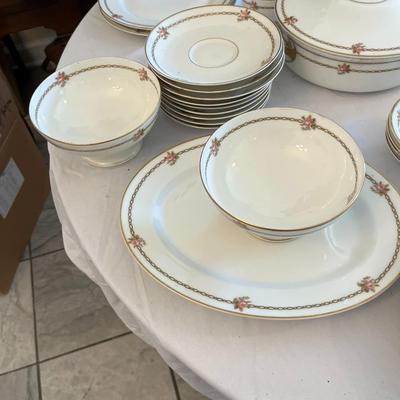 Sale Photo Thumbnail #1148: Theodore Haviland The Hanoi China Set  Made In France  Includes:  1 Serving Platter, 1 Covered Casserole Dish, 1 Coffee cup, 2 Footed Serving Bowls, 2 Salad Plates, 4 Bread Plates, 1 Small Serving Platter, 4 Dinner Plates, 4 Soup Bowls, 4 Desert Bowls, 4 