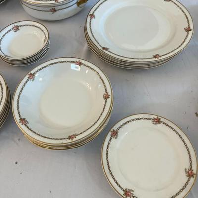 Sale Photo Thumbnail #1150: Theodore Haviland The Hanoi China Set  Made In France  Includes:  1 Serving Platter, 1 Covered Casserole Dish, 1 Coffee cup, 2 Footed Serving Bowls, 2 Salad Plates, 4 Bread Plates, 1 Small Serving Platter, 4 Dinner Plates, 4 Soup Bowls, 4 Desert Bowls, 4 