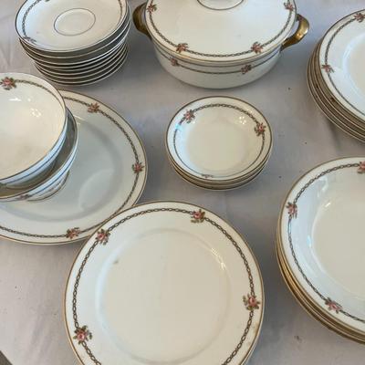 Sale Photo Thumbnail #1149: Theodore Haviland The Hanoi China Set  Made In France  Includes:  1 Serving Platter, 1 Covered Casserole Dish, 1 Coffee cup, 2 Footed Serving Bowls, 2 Salad Plates, 4 Bread Plates, 1 Small Serving Platter, 4 Dinner Plates, 4 Soup Bowls, 4 Desert Bowls, 4 