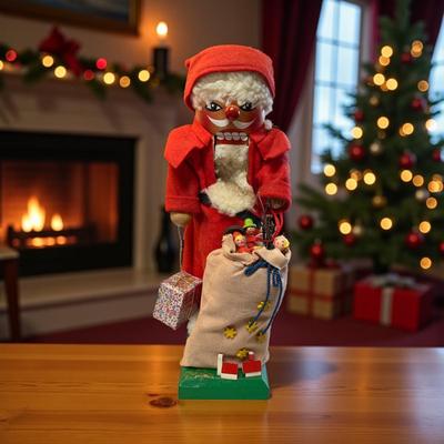 Sale Photo Thumbnail #1184: Santa  Nutcracker by Nutcracker Village    Missing house on front 
Approximately 13" Tall