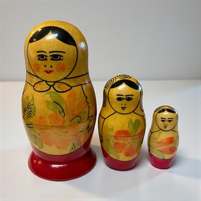 Sale Photo Thumbnail #1190: Vintage Russian Matryoshka Babushka Wooden Dolls Set of 3 Nesting Dolls
Approximately 4.5" Tall