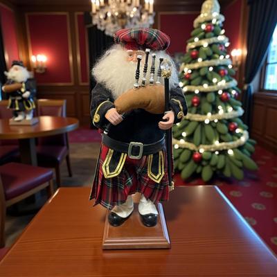 Sale Photo Thumbnail #1207: Scottish Santa Figurine Playing the Bagpipes
Approximately 17.5" Tall
