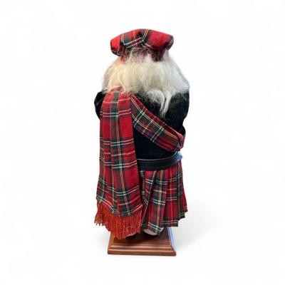 Sale Photo Thumbnail #1206: Scottish Santa Figurine Playing the Bagpipes
Approximately 17.5" Tall