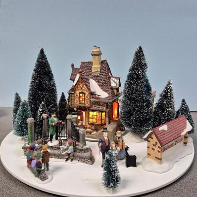 Sale Photo Thumbnail #132: Includes the Childe Pond & Skaters, Christmas Carol Reading, Coffee Stall, Melancholy Tavern, and 
numerous trees.  The turntable rotates, electric power with light.  The turntable is missing one small piece on the understand, but it stills runs 
very wel