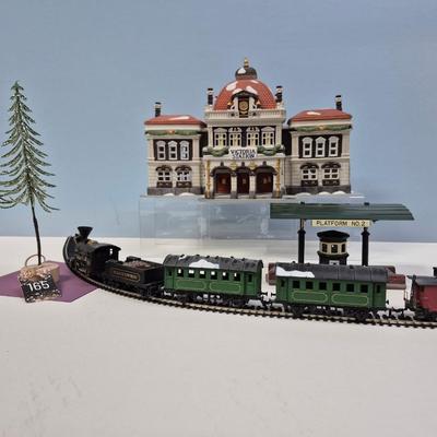 Sale Photo Thumbnail #133: Victoria Station, Platform #2, and 5 car Train Set w/track and transformer. All items are Dept. 56 with original boxes.
