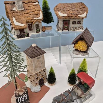 Sale Photo Thumbnail #137: Includes hay shed and silo, horse & carriage, small trees included.
All items are Dept. 56 w/original boxes.