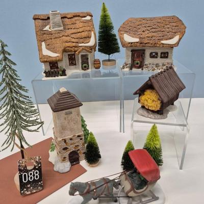 Sale Photo Thumbnail #136: Includes hay shed and silo, horse & carriage, small trees included.
All items are Dept. 56 w/original boxes.