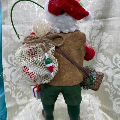 Sale Photo Thumbnail #148: Santa with fishing pole, net, fish basket, waders and boots Good condition, 11 inches tall