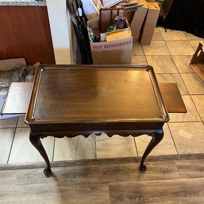 Sale Photo Thumbnail #1216: Queen Anne Tea Table by Henkel Harris Furniture Company
Missing the end Cap on one Slide out and the other has been repaired   
Approximately 18"X29.5"X26"