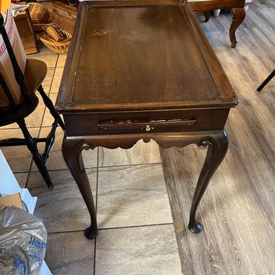 Sale Photo Thumbnail #1219: Queen Anne Tea Table by Henkel Harris Furniture Company
Missing the end Cap on one Slide out and the other has been repaired   
Approximately 18"X29.5"X26"