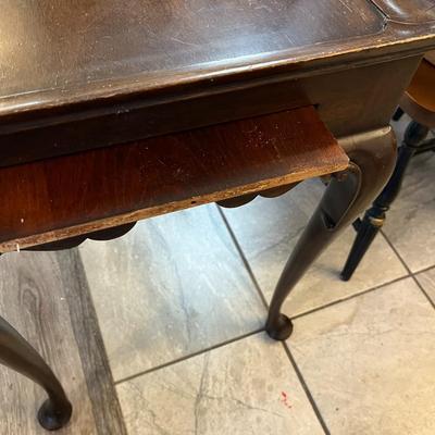 Sale Photo Thumbnail #1217: Queen Anne Tea Table by Henkel Harris Furniture Company
Missing the end Cap on one Slide out and the other has been repaired   
Approximately 18"X29.5"X26"