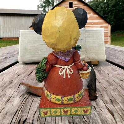 Sale Photo Thumbnail #1256: Disney Jim Shore Traditions Minnie with Mag & Gift Figurine
Approximately 9" Tall
