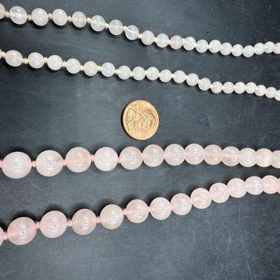 Sale Photo Thumbnail #108: Both necklaces are the same length (approx. 28"), one has a small bead and the other has a larger bead.  Both in good condition.