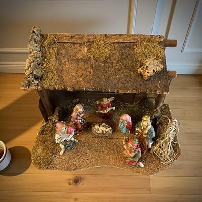 Sale Photo Thumbnail #1297: Large House of Lloyd Nativity Scene Set.  Has Light   Missing one Wise Man
Approximately  24"X16"X16"