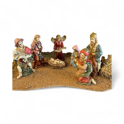Sale Photo Thumbnail #1298: Large House of Lloyd Nativity Scene Set.  Has Light   Missing one Wise Man
Approximately  24"X16"X16"