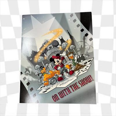 Sale Photo Thumbnail #1313: Walt Disney World Collectors Society Box including, The Magic Begins With Me Book, On With The Show Photo, Cast Holiday Celebration Framed Photo, I Year Anniversary Card, Two Disney Dollars, One December 31, 1999 Entrance Ticket, Disney Cash Handling Manu