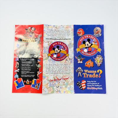 Sale Photo Thumbnail #1304: Walt Disney World Collectors Society Box including, The Magic Begins With Me Book, On With The Show Photo, Cast Holiday Celebration Framed Photo, I Year Anniversary Card, Two Disney Dollars, One December 31, 1999 Entrance Ticket, Disney Cash Handling Manu