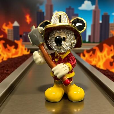 Sale Photo Thumbnail #1321: Walt Disney Mickey Mouse Firefighter Jeweled Figurine In Box, COA   This Figurine is crafted Arribas Brothers and is encrusted with Swarovski Crystals.  It is part of the Disney Collection of Jeweled Figurines.  This Figurine is made of enameled metal