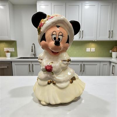 Sale Photo Thumbnail #1355: Disney Minnie Mouse Christmas White Dress Shaker.
Approximately 4" tall