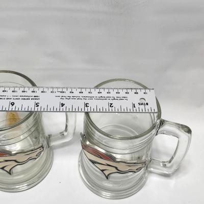 Two Denver Broncos Macho mugs with a collectible Officially Licensed NFL Denver Product in a quill pen box