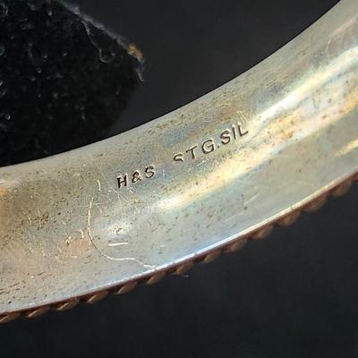 Sale Photo Thumbnail #183: Ornate 925 hinged bangle, with rope border,  Safety catch and chain. 
Retail $250