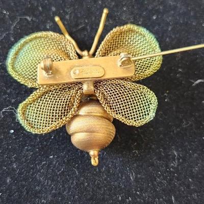 Sale Photo Thumbnail #204: by Sarah Cavendar, 4 coarse wings with etched metal body
Signed, 2 x 2 inches 
Retail $120