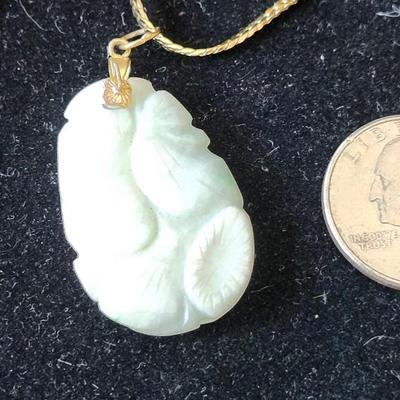 Sale Photo Thumbnail #206: The pendant is a beautiful soft pale green/ivory color, very delicate color.
The chain is Napier, 26 inches 
Retail $300++