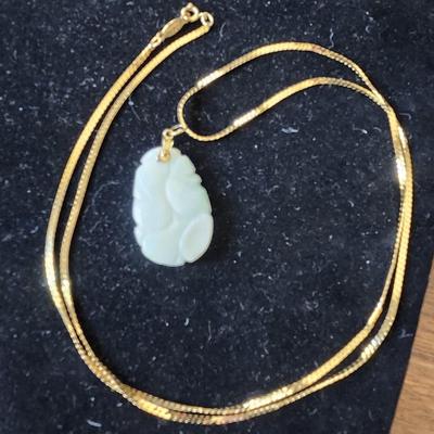 Sale Photo Thumbnail #208: The pendant is a beautiful soft pale green/ivory color, very delicate color.
The chain is Napier, 26 inches 
Retail $300++