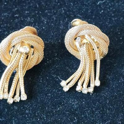 Sale Photo Thumbnail #211: Gold tone T - rhinestone waterfall design. Signed
Necklace is 15.5 inches.  Clip earrings
excellent condition 
Retail $300.00