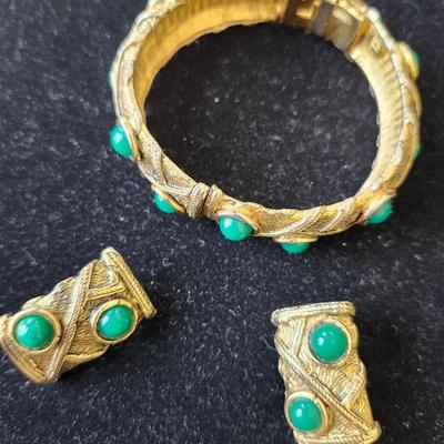 Sale Photo Thumbnail #215: Gold tone settings with green chrysoprase stone cabochons.  
All pieces are stamped HOBE.  
Retails at over $500