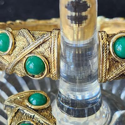 Sale Photo Thumbnail #217: Gold tone settings with green chrysoprase stone cabochons.  
All pieces are stamped HOBE.  
Retails at over $500