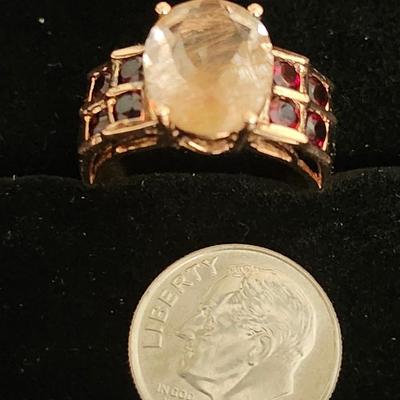 Sale Photo Thumbnail #224: 925    INDIA   SIZE 8
Nice condition
Rutilated quartz has ribbons of black tourmaline running through the stone.  
The garnets set off the quartz stone very well.