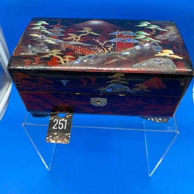 Sale Photo Thumbnail #227: With key, music works.  Dancing Couple
Mirrored interior
Mother of Pearl inlay
Small chips on the front