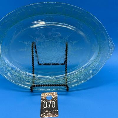 Sale Photo Thumbnail #228: Rare Oval 11.75 inch lime green depression glass
1930-1934
Referred to as uranium glass for luminescence.