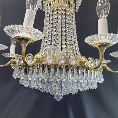 Sale Photo Thumbnail #249: This is an amazing piece,  perfect for an entryway or large dining room.
Multi-tiered, 8 candle
It needs electrician installation, hard wired
There are crystal prisms at the top center, and below mirrored base
3 center lights
22 inches tall, 22 inches wid