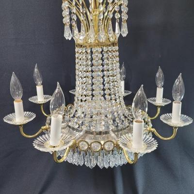 Sale Photo Thumbnail #248: This is an amazing piece,  perfect for an entryway or large dining room.
Multi-tiered, 8 candle
It needs electrician installation, hard wired
There are crystal prisms at the top center, and below mirrored base
3 center lights
22 inches tall, 22 inches wid