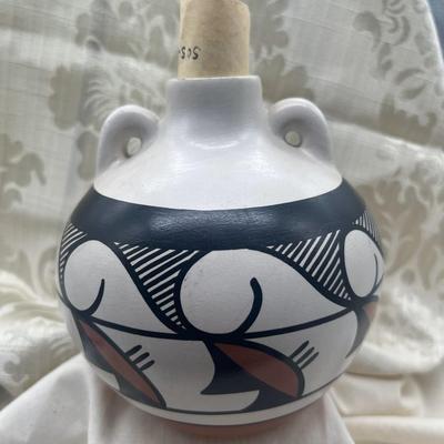 Sale Photo Thumbnail #258: Handpainted Vintage Native American ZIA pottery
6 x 6.5 inches 
There are a few scuff marks near the bottom