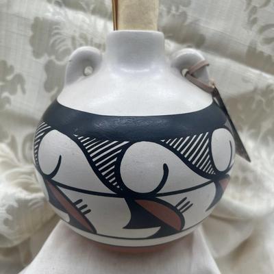 Sale Photo Thumbnail #259: Handpainted Vintage Native American ZIA pottery
6 x 6.5 inches 
There are a few scuff marks near the bottom