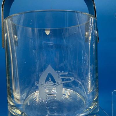 Sale Photo Thumbnail #261: Orrefors crystal ice bucket. it has a flea bite on the rim.  6.5 inches tall 
4 vintage champagne / sherbert stems, good condition( 1 has a flea bite)