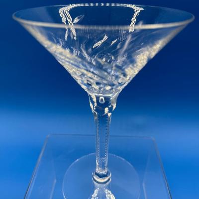 Sale Photo Thumbnail #262: Orrefors crystal ice bucket. it has a flea bite on the rim.  6.5 inches tall 
4 vintage champagne / sherbert stems, good condition( 1 has a flea bite)