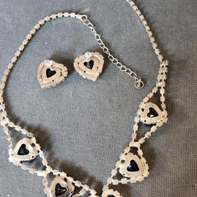 Sale Photo Thumbnail #268: Just in time for the holiday gatherings!
This lovely set is in very good condition.  Pierced earrings, choker length necklace of 
blue hearts surrounded by clear stones.