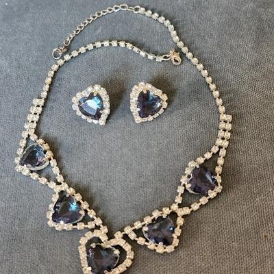 Sale Photo Thumbnail #269: Just in time for the holiday gatherings!
This lovely set is in very good condition.  Pierced earrings, choker length necklace of 
blue hearts surrounded by clear stones.