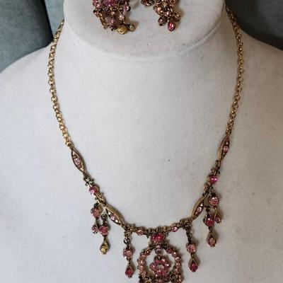 Sale Photo Thumbnail #270: the set is completed with a matching set of pierced earrings.

Fun to wear, anywhere