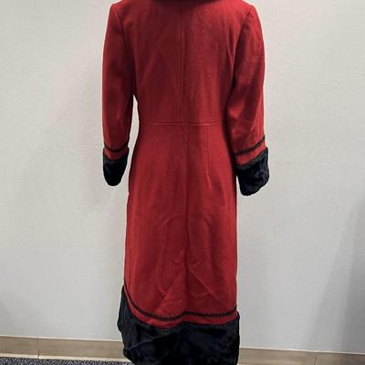 Sale Photo Thumbnail #277: This is a stunning coat.  Ladies wool coat with faux black fur trim, size small (Probably 4 to 6) 
It is in very good condition.